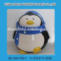 Cutely pingüino de cerámica azúcar y crema conjunto con una cuchara